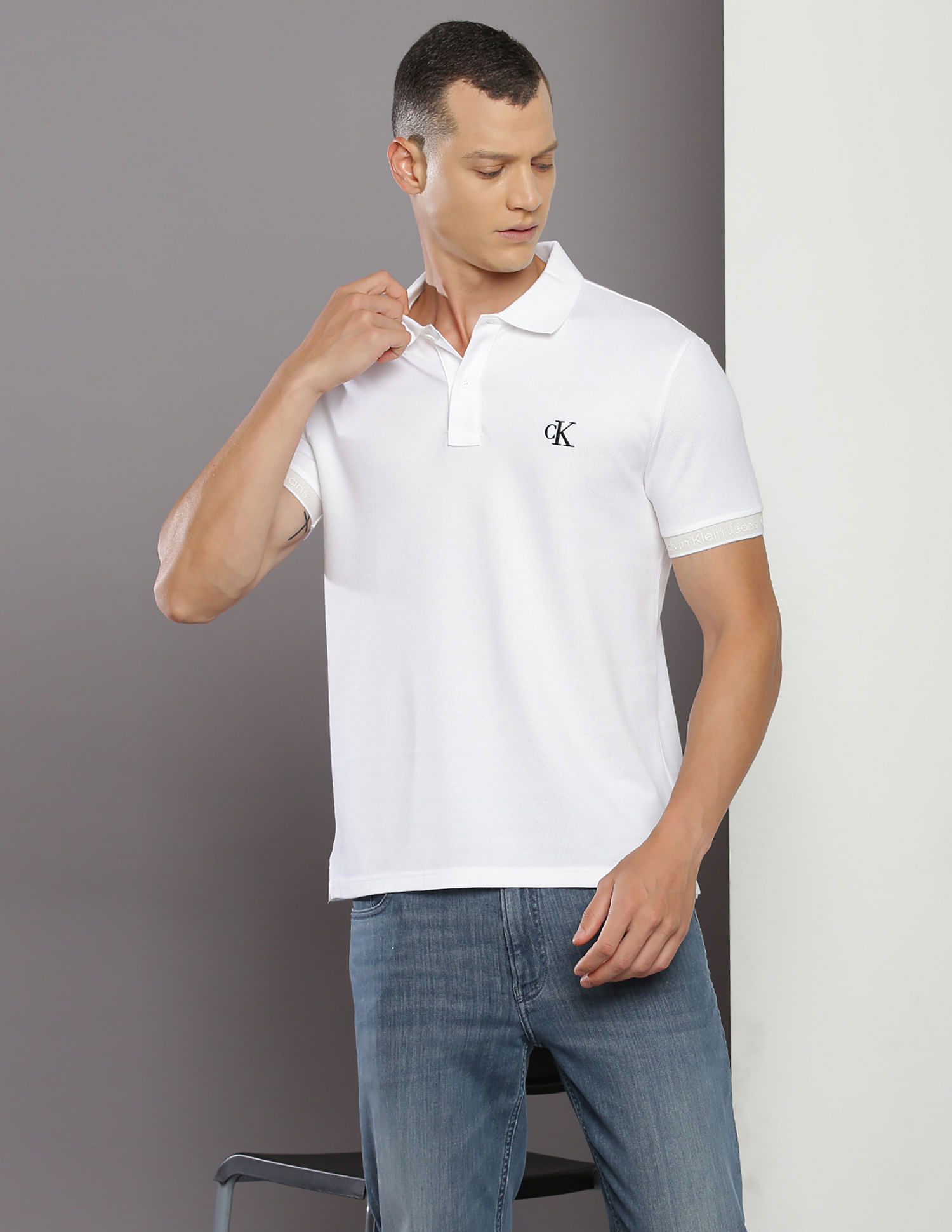 Buy Calvin Klein Solid Short Sleeve Polo Shirt - NNNOW.com