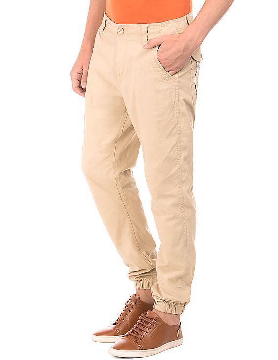 Buy FLYING MACHINE Solid Cotton Relaxed Fit Men's Casual Trousers |  Shoppers Stop