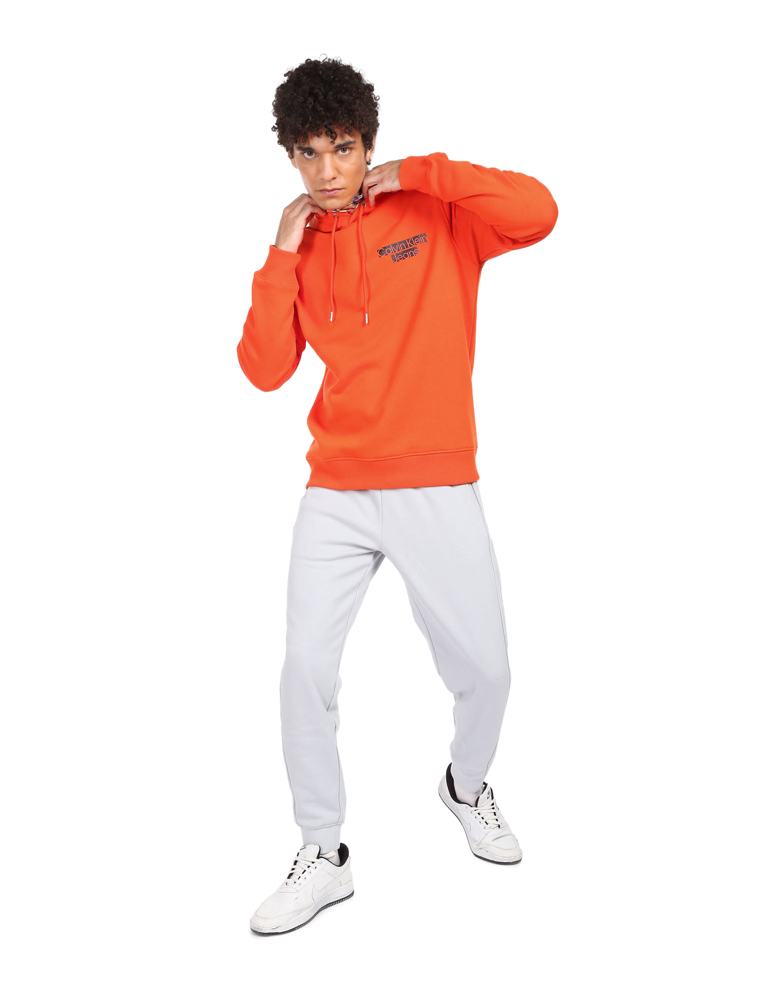 Buy Calvin Klein Men Orange Solid Hooded Sweatshirt