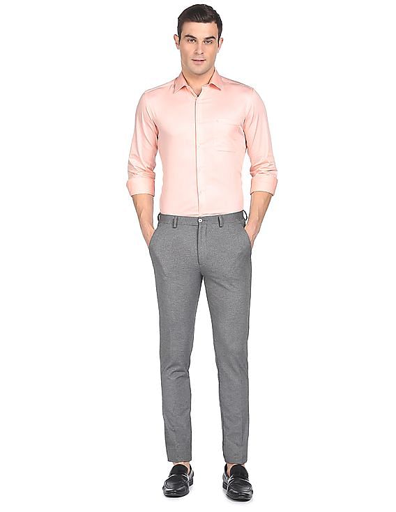 peach shirt grey pants