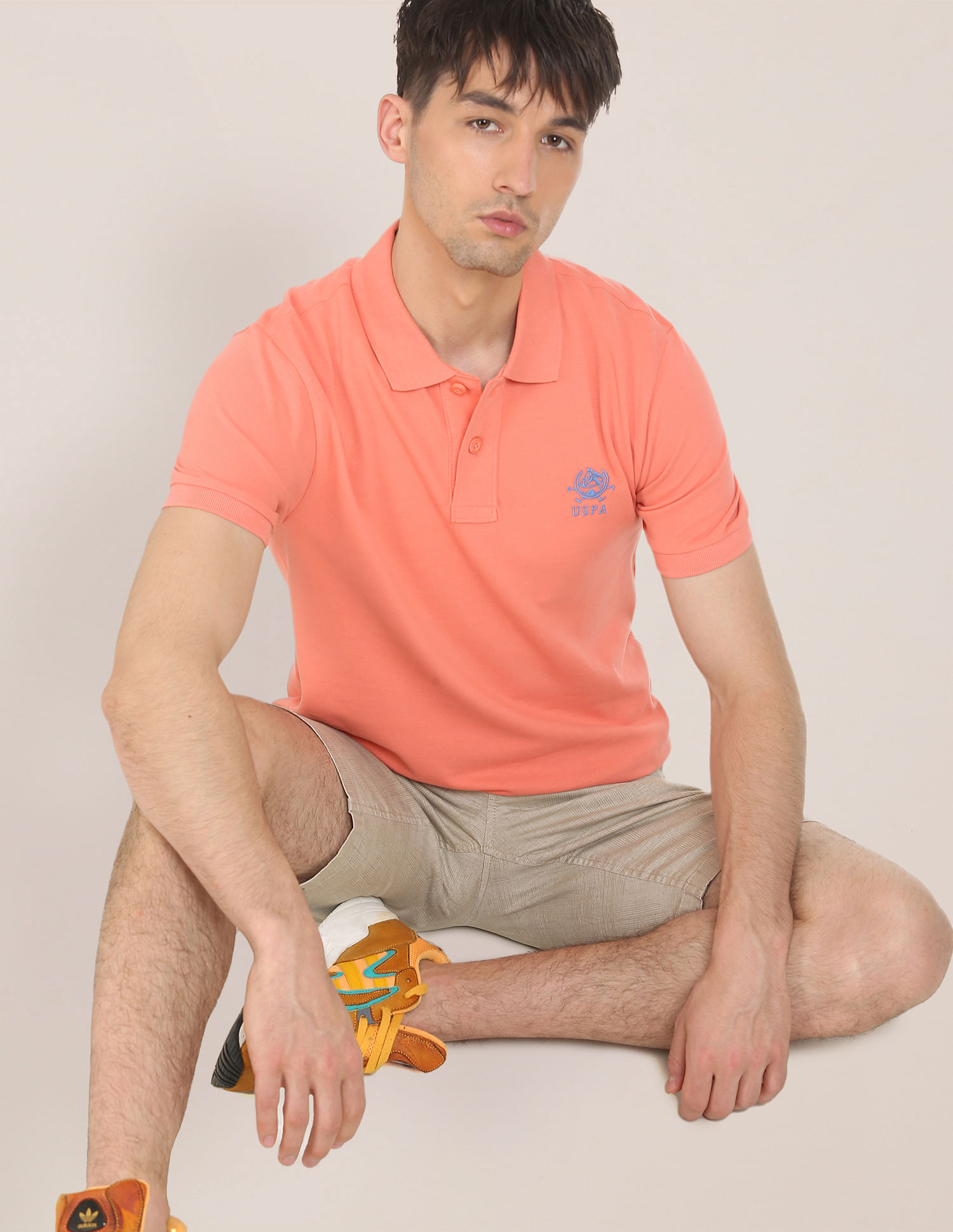 U.S. Polo Assn. Men Coral Ribbed Collar Solid Polo Shirt