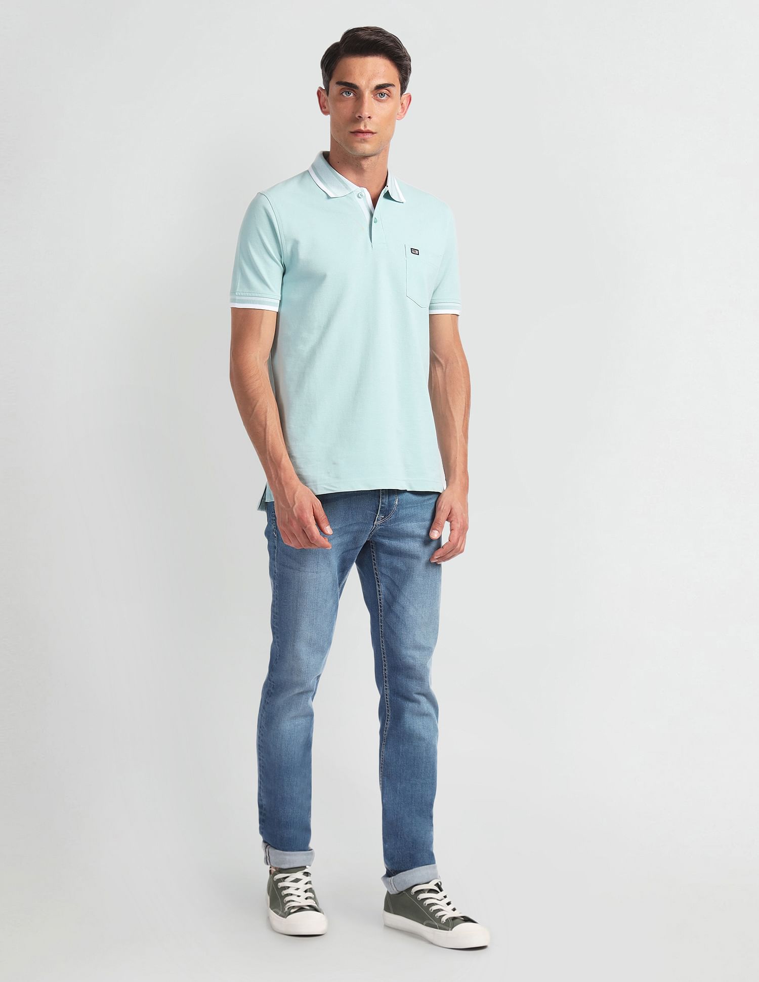 Arrow Sports Striped Collar Solid Polo Shirt