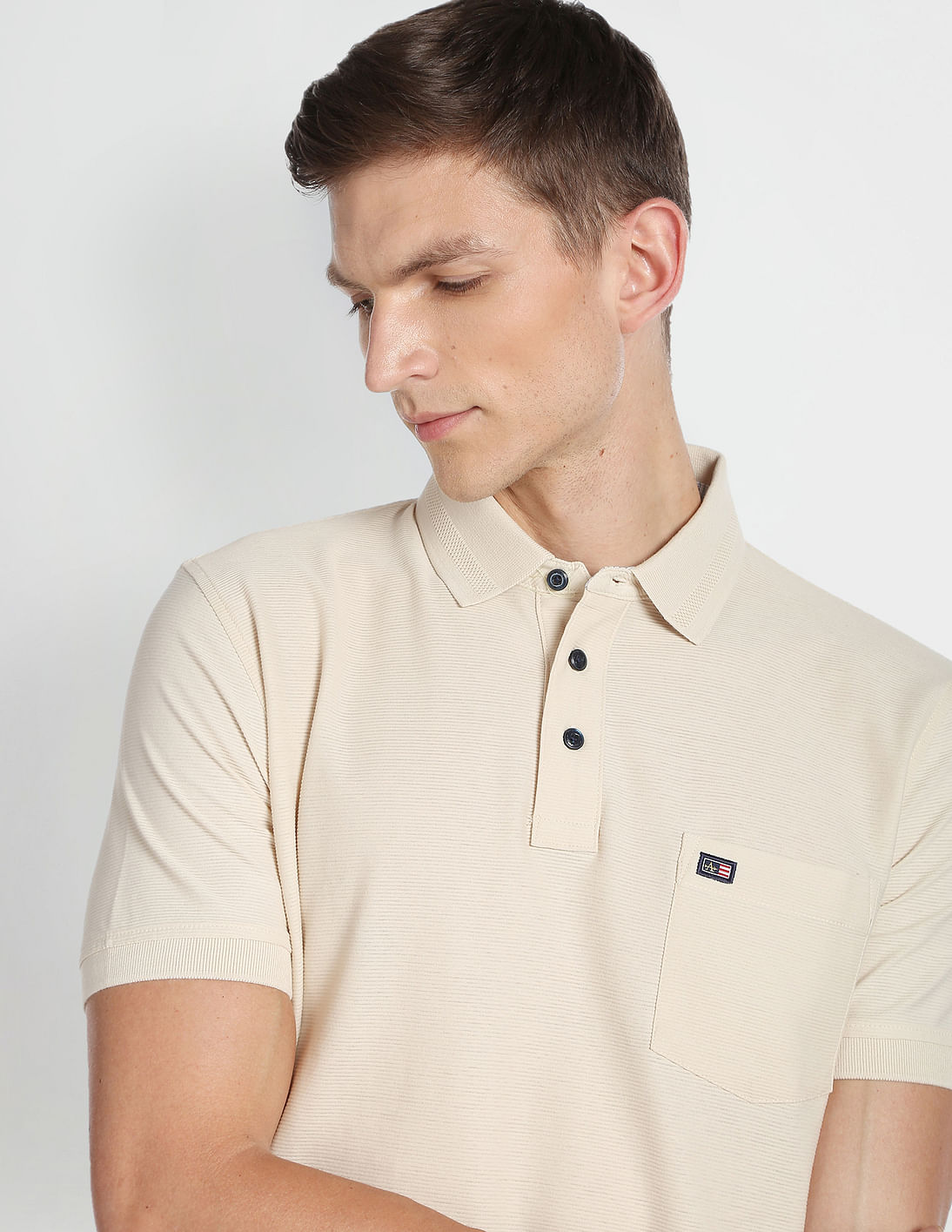 Buy Arrow Sports Men Cream Ribbed Collar Textured Polo Shirt - NNNOW.com