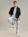 Tommy Hilfiger Heavy-Wash Slim Fit Mid Rise Jeans