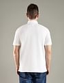 Tommy Hilfiger Solid Regular Fit Cotton Polo T-Shirt