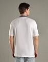 Tommy Hilfiger Solid Regular-Fit Cotton Polo T-Shirt