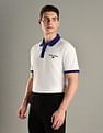 Tommy Hilfiger Solid Regular-Fit Cotton Polo T-Shirt